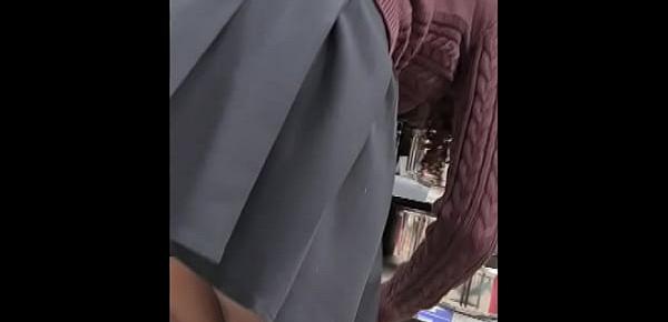  SPYING TEEN GIRL AT SUPERMARKET - SHORT SKIRT